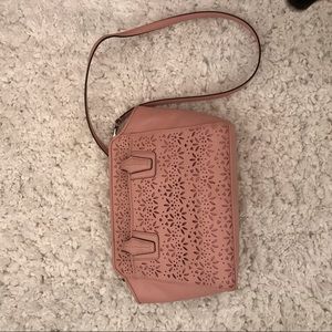 Pink Coach eyelet design handbag
